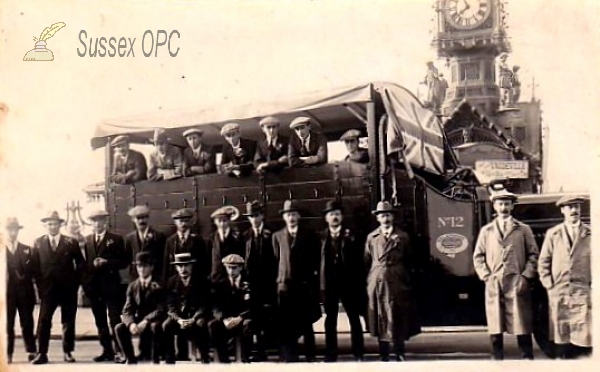 Image of Brighton - Men beside truck
