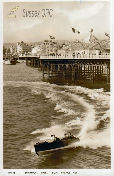 Image of Brighton - Speed boat and Palace Pier