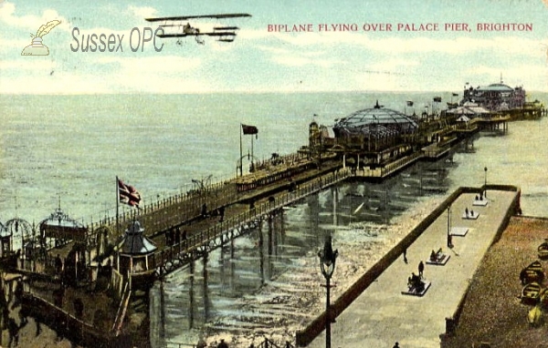 Image of Hastings - Biplane over the Pier