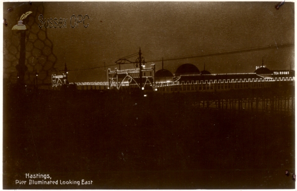 Image of Hastings - The Pier illuminated looking east
